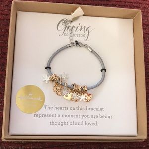 Leather cord bracelet with gold and silver charms